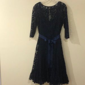 Lace detail dress with allover pintucks. Unused